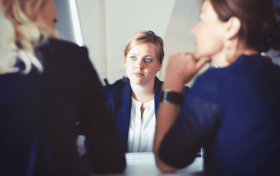 Three women in a meeting