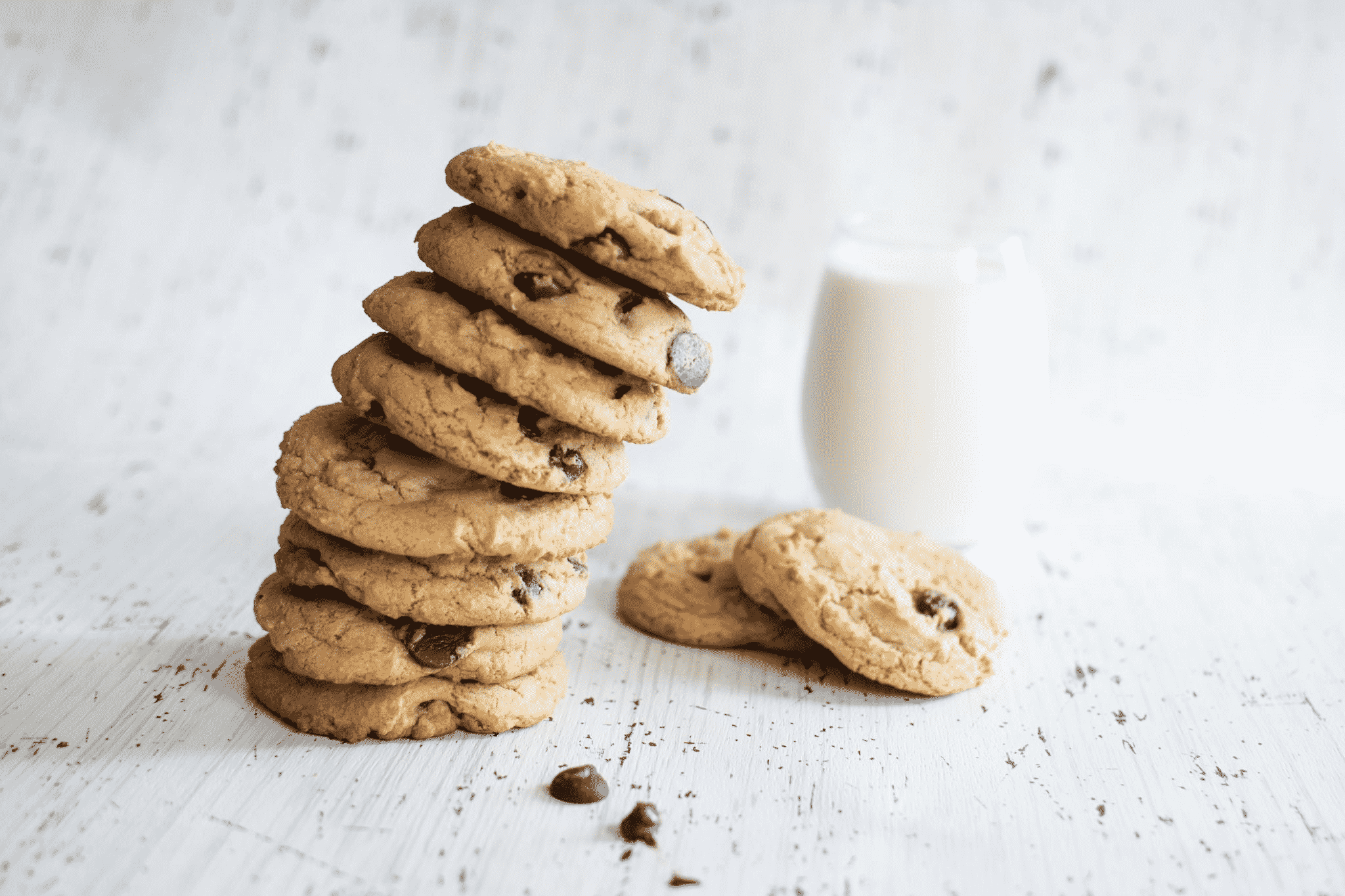 tower of cookies and a glass of milk
