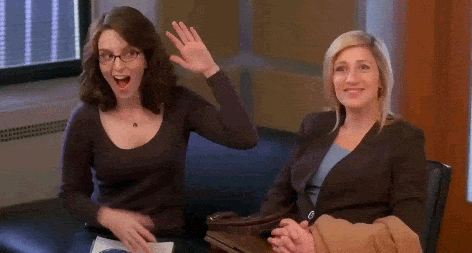 gif of Tina Fey in the show 30 Rock giving herself a highfive.