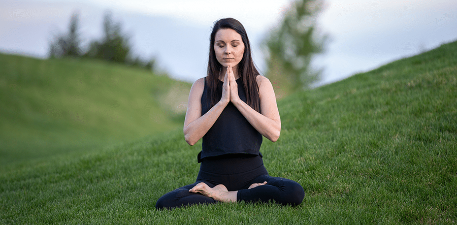 woman meditating outdoor