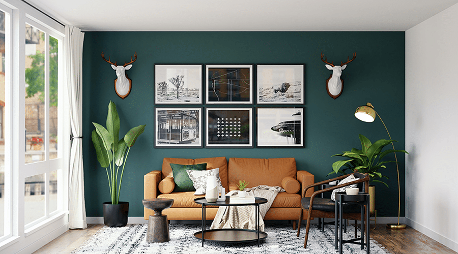 Declutter but keep decor that shows some personality like this living room with deer heads and black and white prints on the wall.