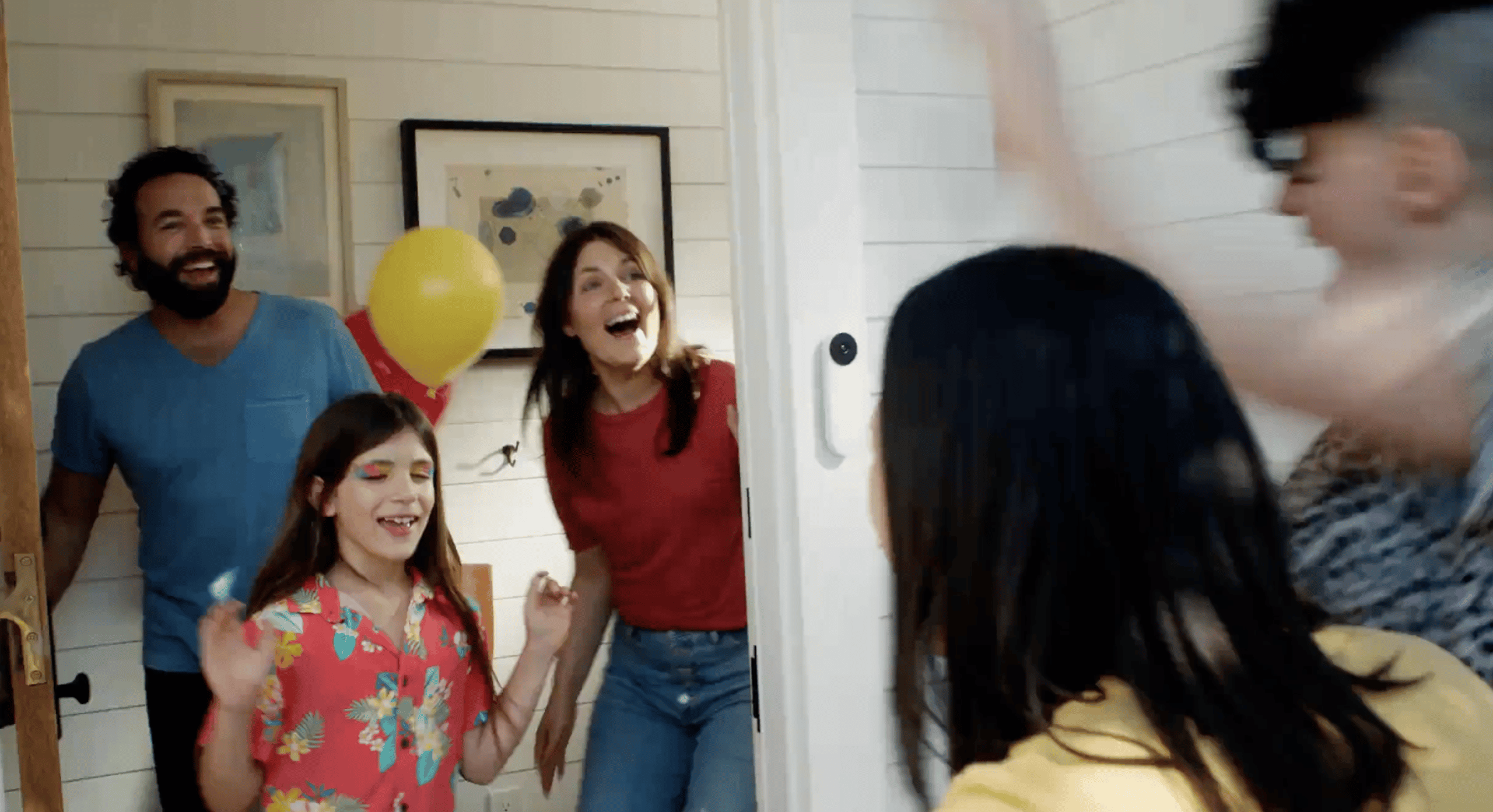 Photos of a family answering their door to friends on their child's birthday