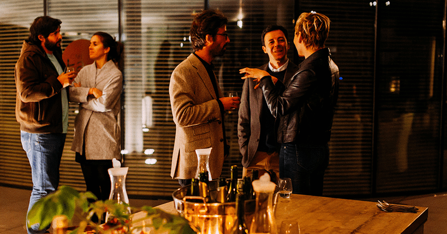 people mingling at a cocktail party