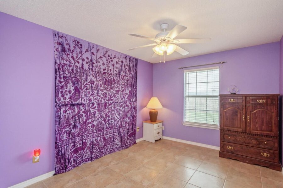 Each room was different. This bedroom was painted purple.