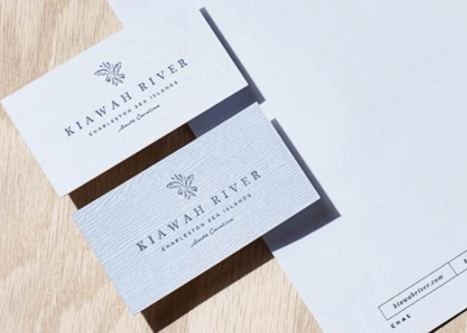 Close up of Kiawah River development business cards with special attention to the grain texture designed by SDCO Partners