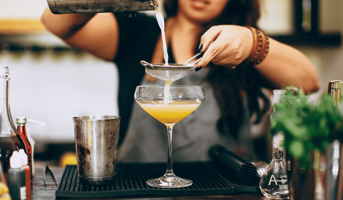 mixologist creating a cocktail