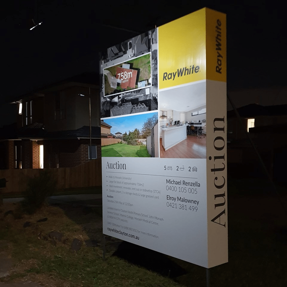 A three-dimensional real estate sign powered by solar lights