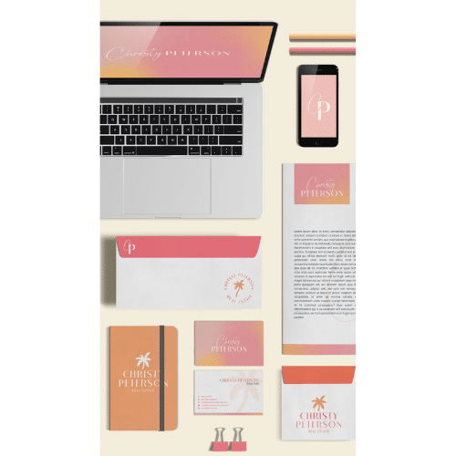 Branded collateral on business cards, stationery, computer, and cell phone.