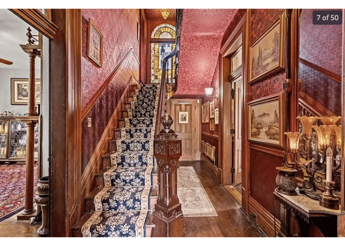 Staircase and entryway of Victorian mansion
